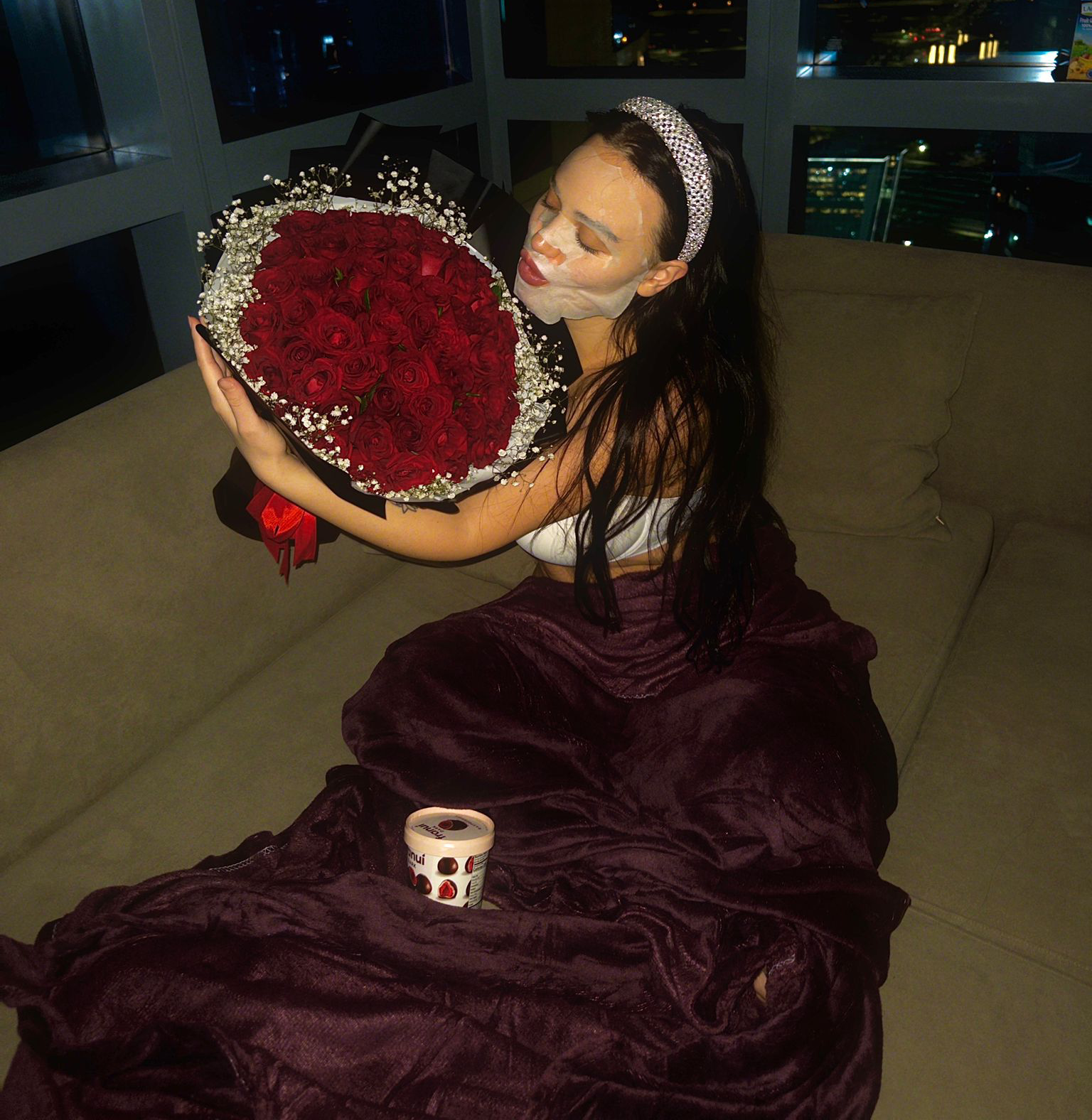 Mery applying lipstick